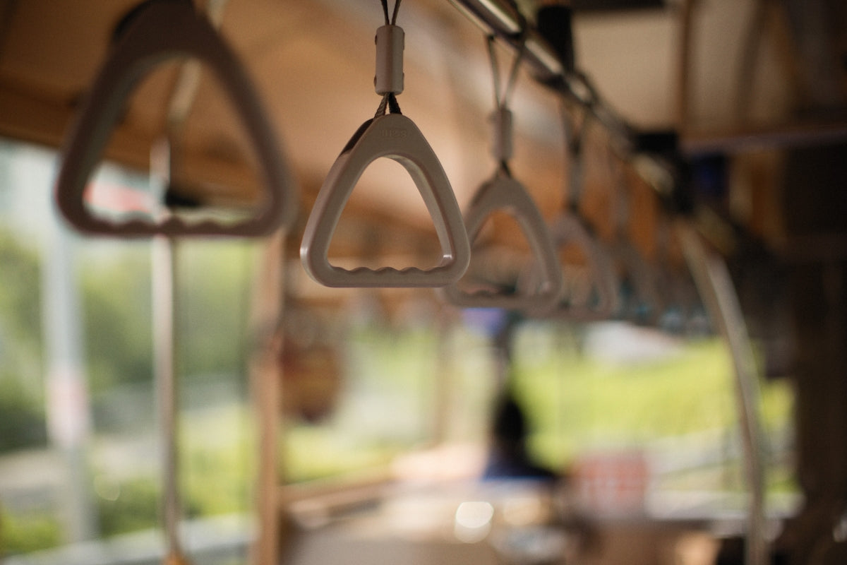 a row of hanging objects on a bus